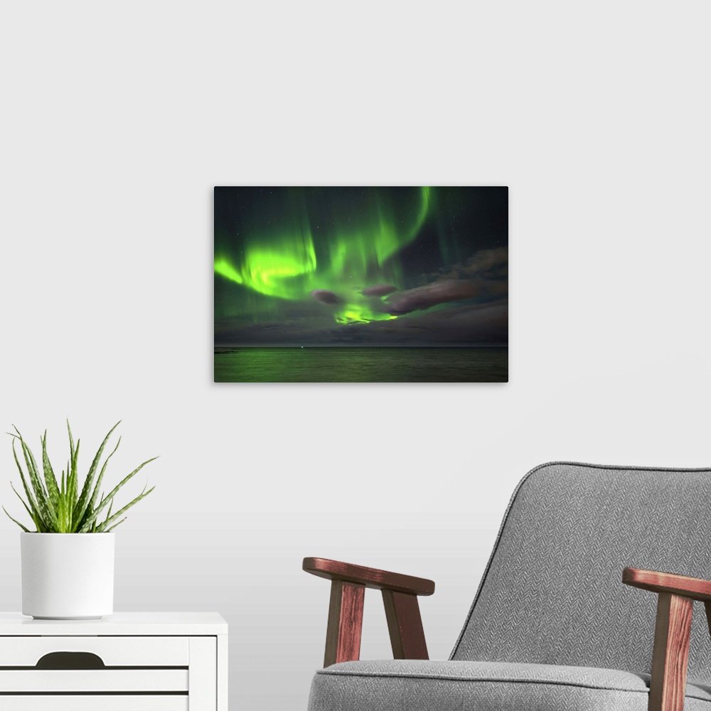A modern room featuring Aurora Borealis or Northern Lights, Reykjavik, Iceland