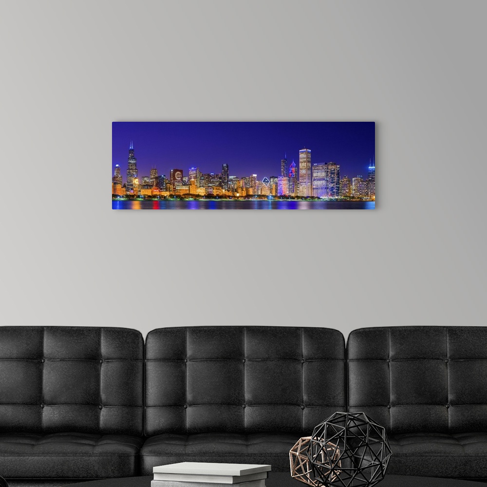 A modern room featuring Chicago skyline with Cubs World Series lights night, Lake Michigan, Chicago, Cook County, Illinoi...