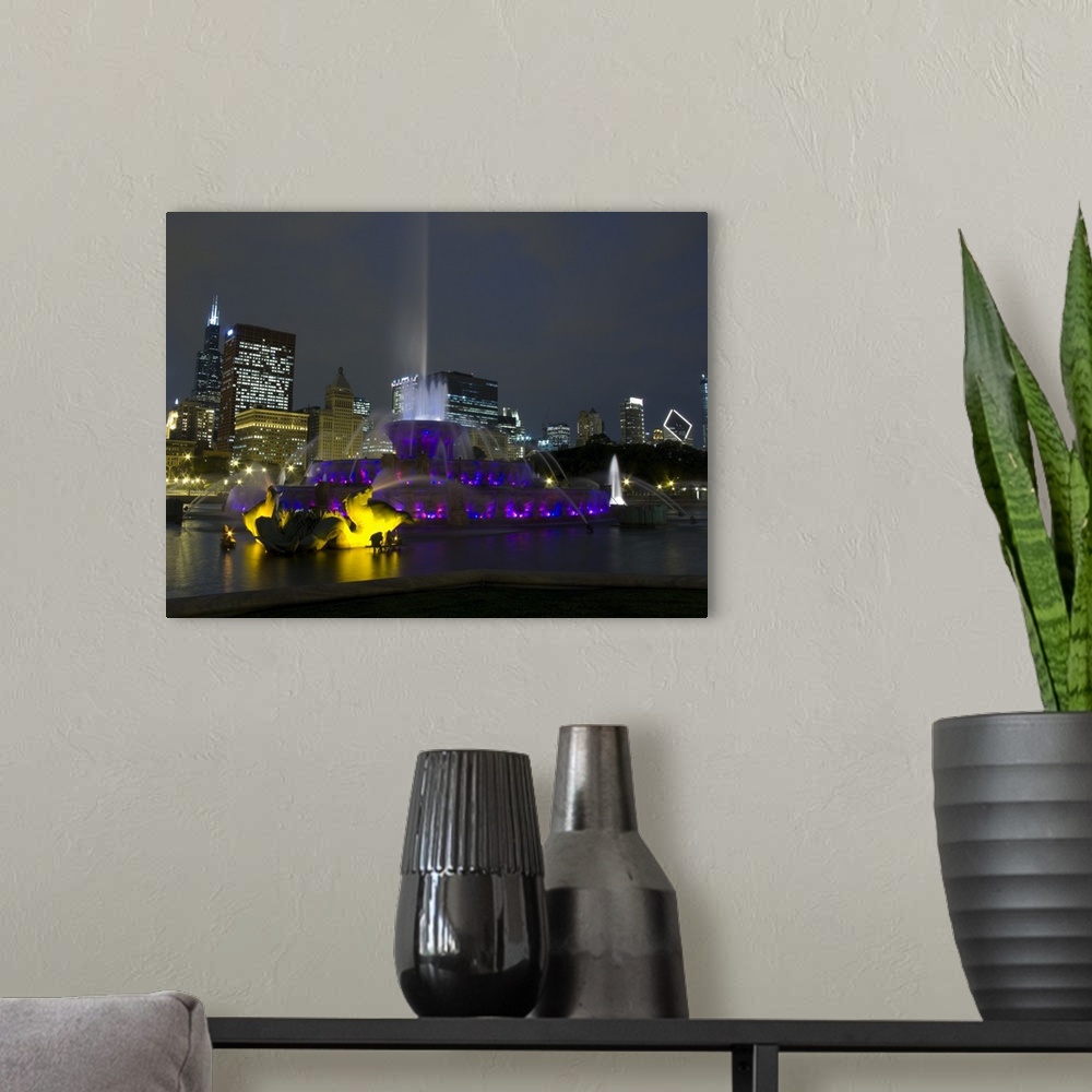 A modern room featuring Illuminated fountain with skyscrapers in a city, Buckingham Fountain, Grant Park, Chicago, Illinois,
