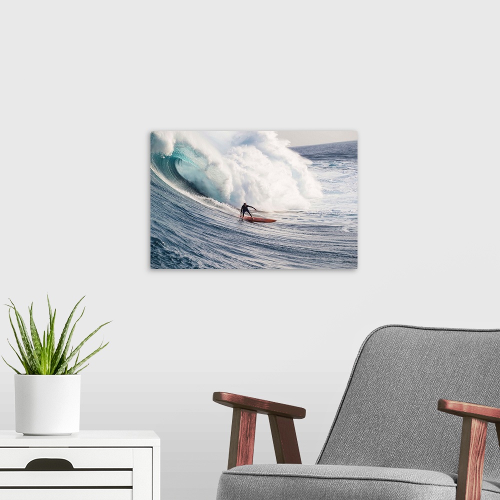 A modern room featuring Male surfer surfing wave in Pacific Ocean, Peahi, Hawaii, USA