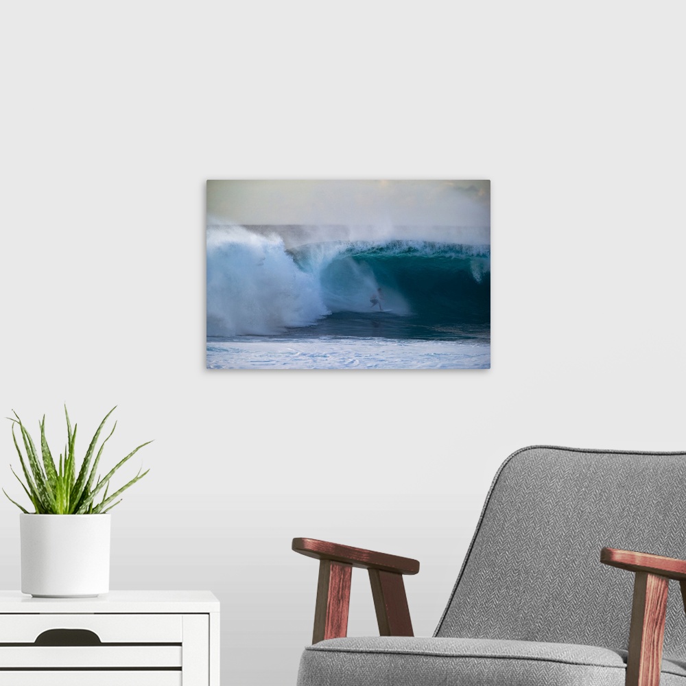 A modern room featuring Man surfing down a wave on beach, Hawaii, USA