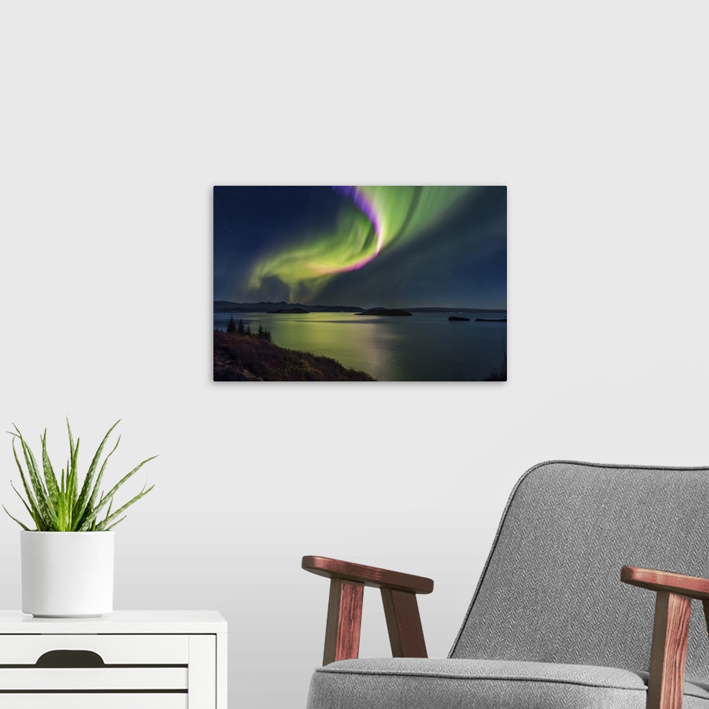 A modern room featuring Northern Lights over Thingvallavatn, Thingvellir National Park. Iceland