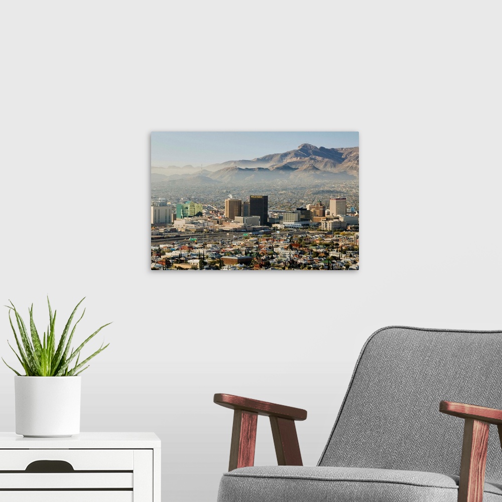 A modern room featuring Panoramic view of skyline and downtown El Paso Texas looking toward Juarez, Mexico