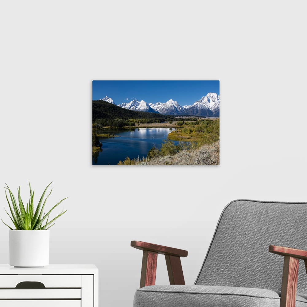 A modern room featuring River with mountain range in the background, Teton Range, Grand Teton National Park, Wyoming, USA