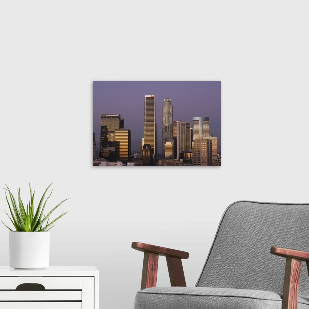 A modern room featuring Skyscrapers at dusk, Los Angeles, California, USA