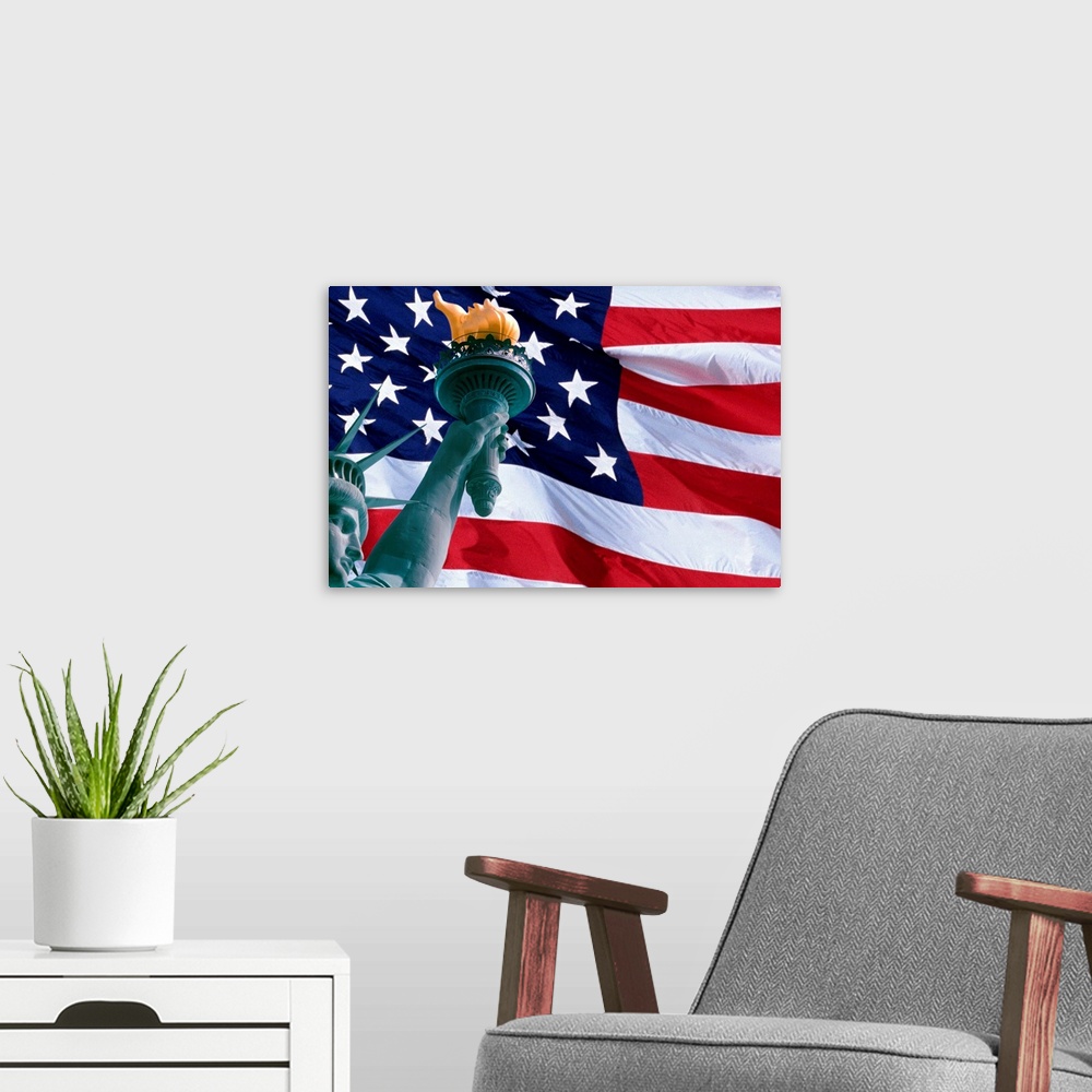 A modern room featuring Large, landscape photograph of the American Flag, the face of the Statue of Liberty in the bottom...