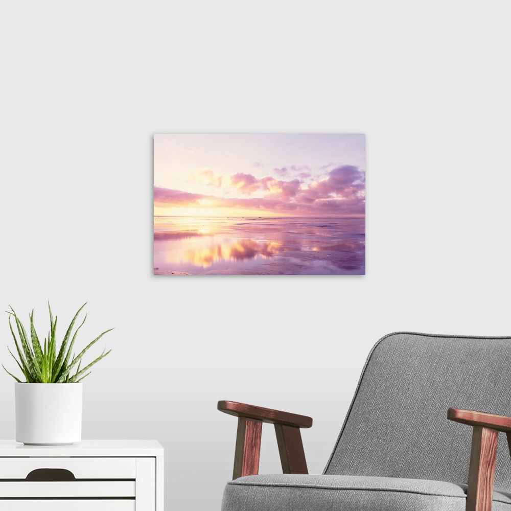 A modern room featuring Sunrise On Beach, North Sea, Germany