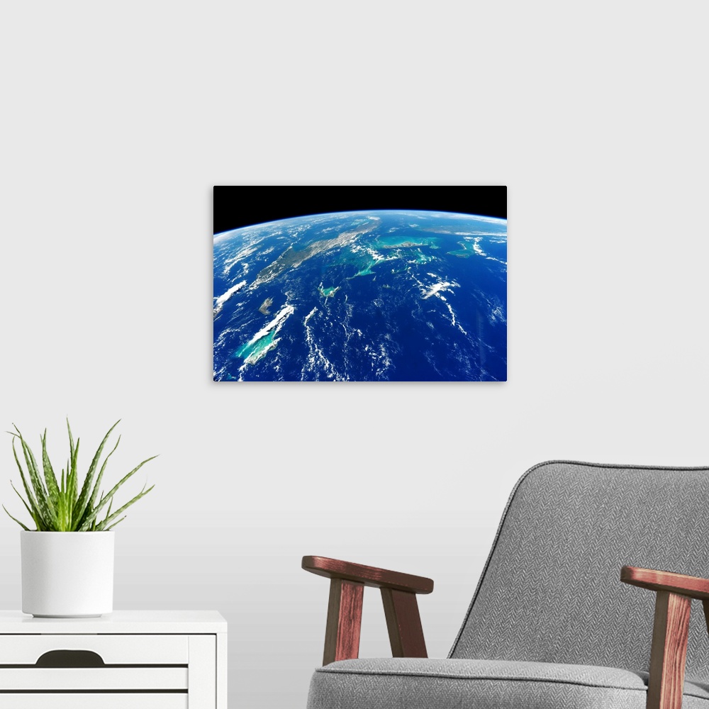 A modern room featuring View of planet Earth from space showing Turks and Caicos Islands and Cuba