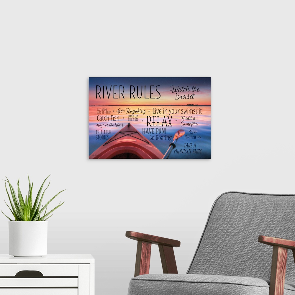 A modern room featuring Photo of a kayak on a lake at sunset, with "River Rules" in different fonts and sizes around it.