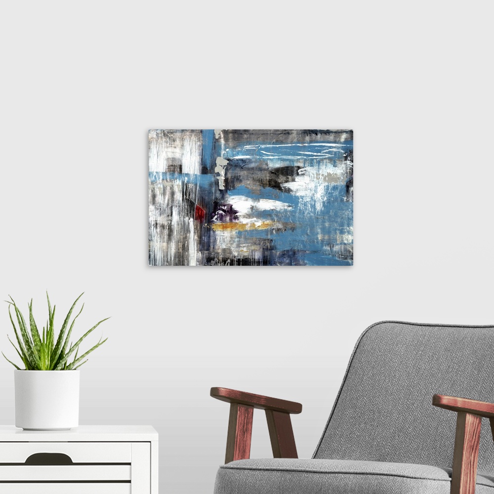 A modern room featuring Contemporary abstract painting using blue and gray tones smeared together and washed looking.