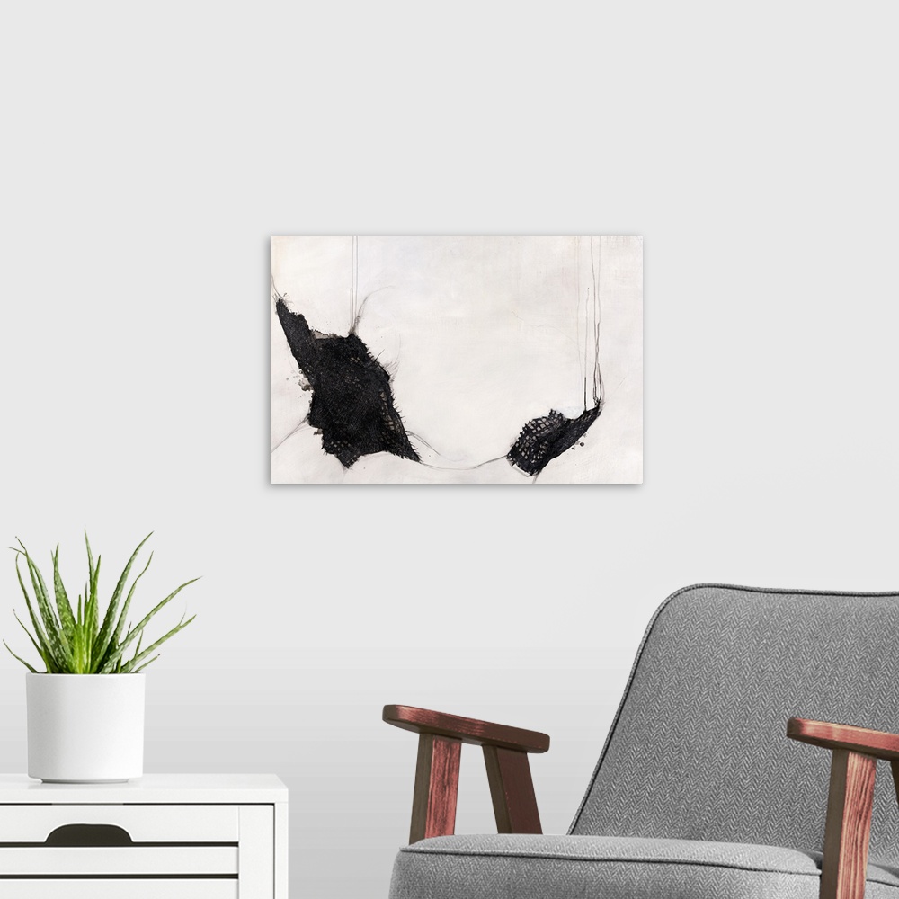 A modern room featuring Black and white abstract painting with brown squares on top of the black designs creating a mesh ...