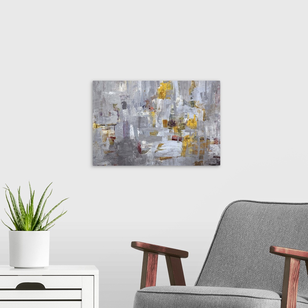 A modern room featuring Contemporary abstract painting using mostly gray tones with hints of gold.