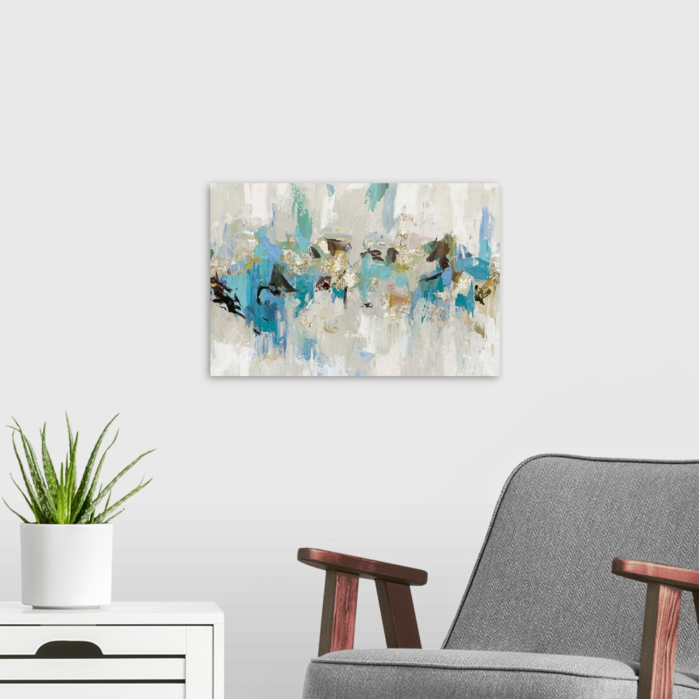 A modern room featuring Large abstract artwork made with shades of blue, gray, brown, and gold.
