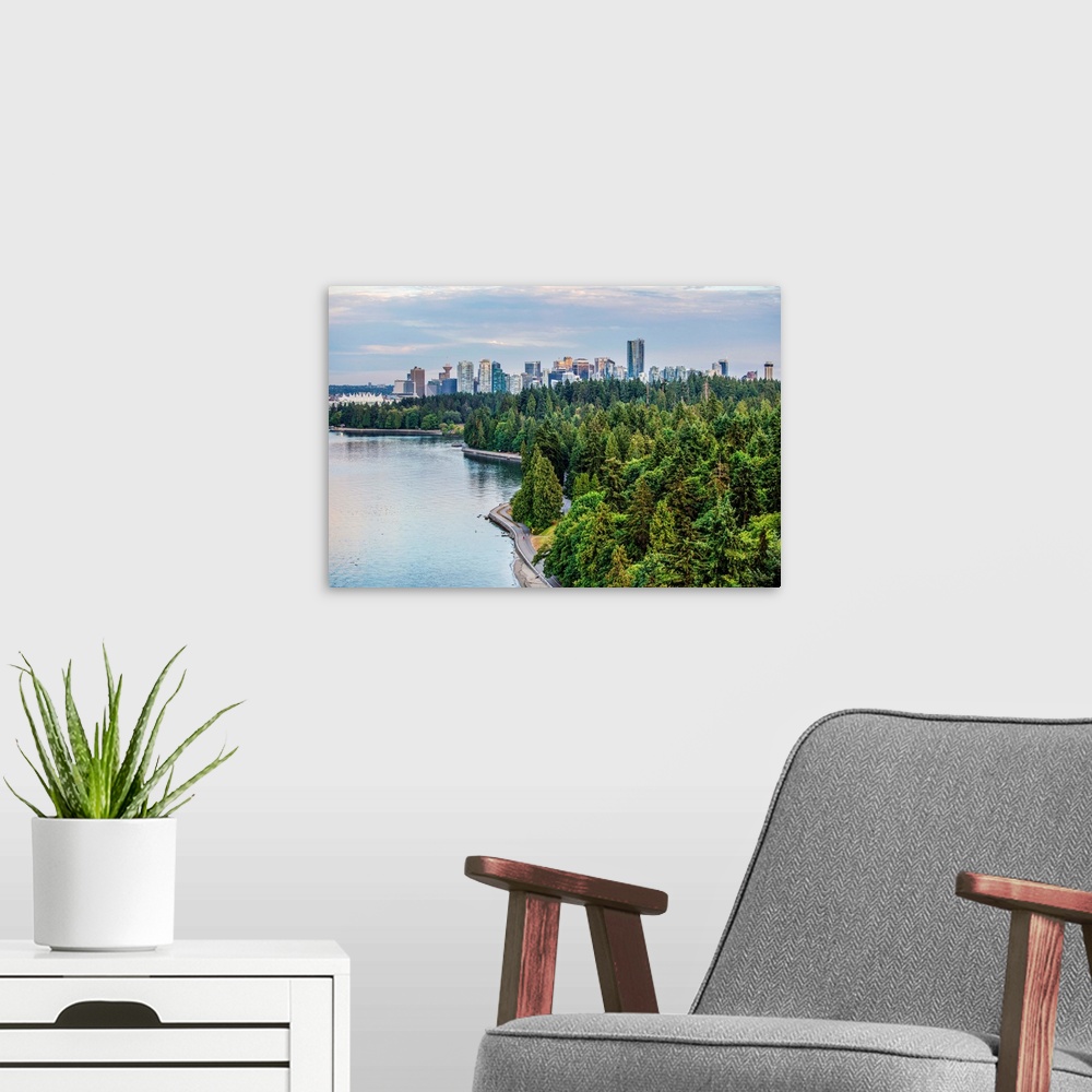 A modern room featuring Elevated view of downtown Vancouver and Stanley Park Seawall Path in British Columbia, Canada.