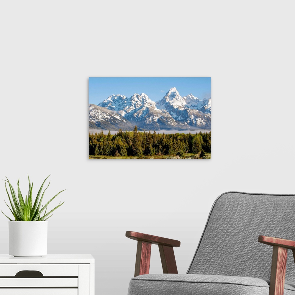 A modern room featuring View of the Middle Teton, Grand Teton and Mount Owen in Grand Teton National Park, Wyoming.