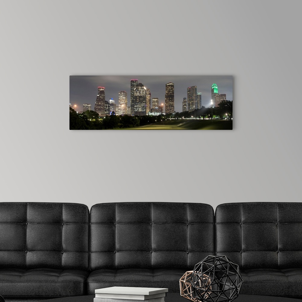 A modern room featuring Panoramic photograph of the Houston TX skyline at night from Eleanor Tinsley Park.