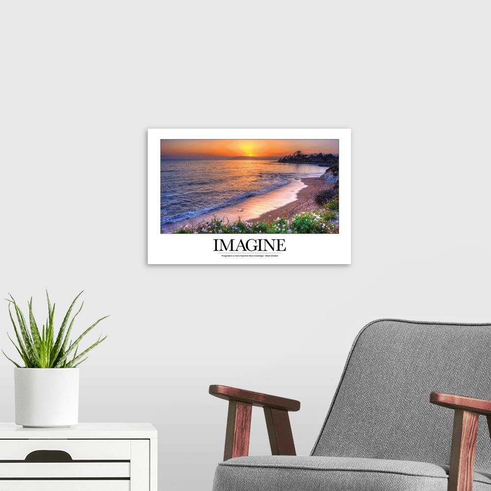 A modern room featuring This photograph is taken of a sunset over the ocean and beach with the word Imagine written out b...