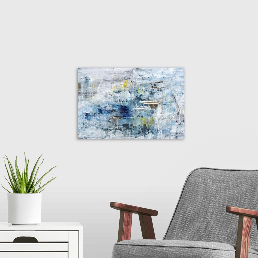 A modern room featuring A textured abstract painting in shades of blue and gray with elements of yellow throughout.