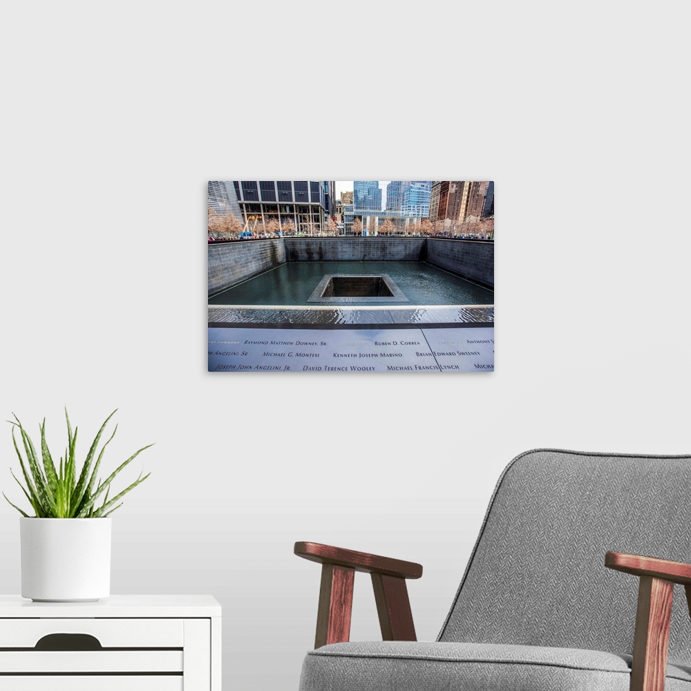 A modern room featuring View of 9/11 Memorial South Pool in New York City.
