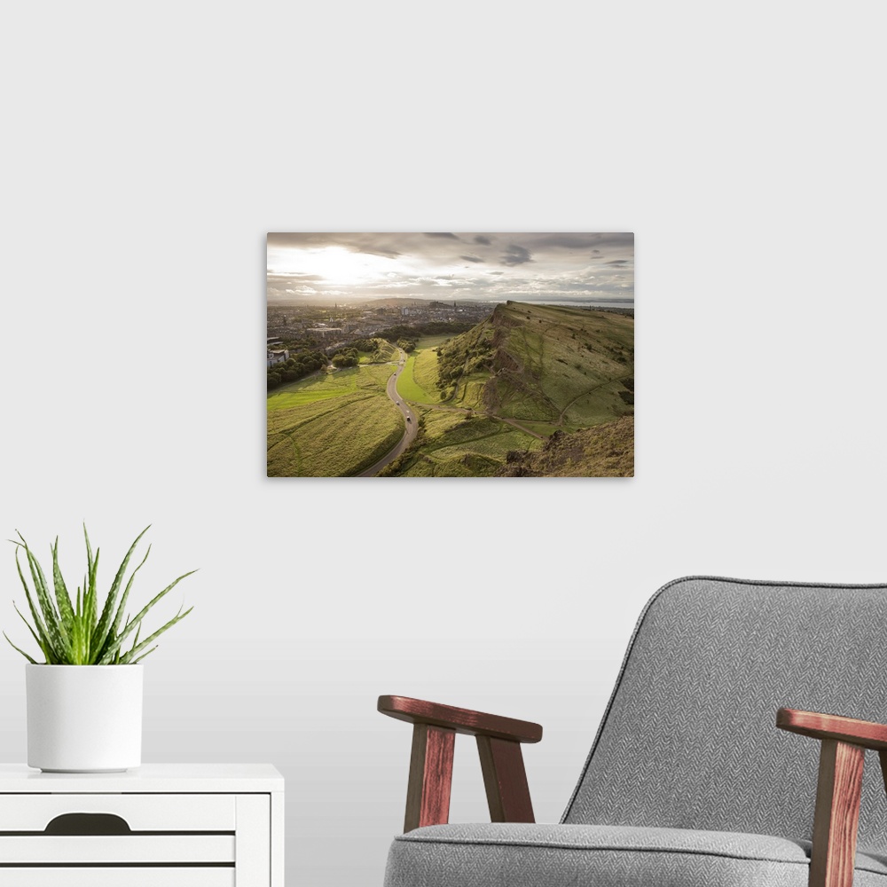 A modern room featuring Photograph of Salisbury Crags, Castle Rock, and the city of Edinburgh, Scotland from Holyrood Park.