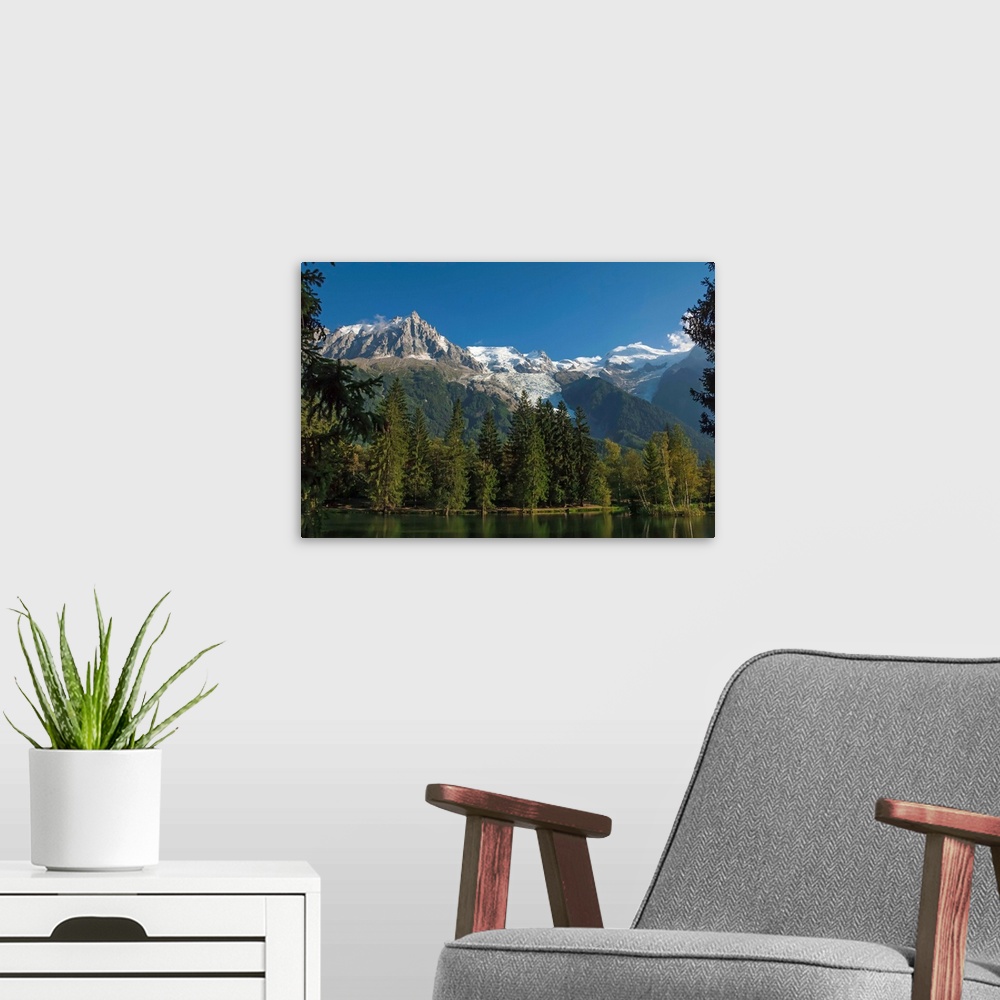 A modern room featuring Aiguile du Midi and Mont Blanc, 4809m, and the Glaciers, from the Lake, Chamonix, Haute Savoie, F...