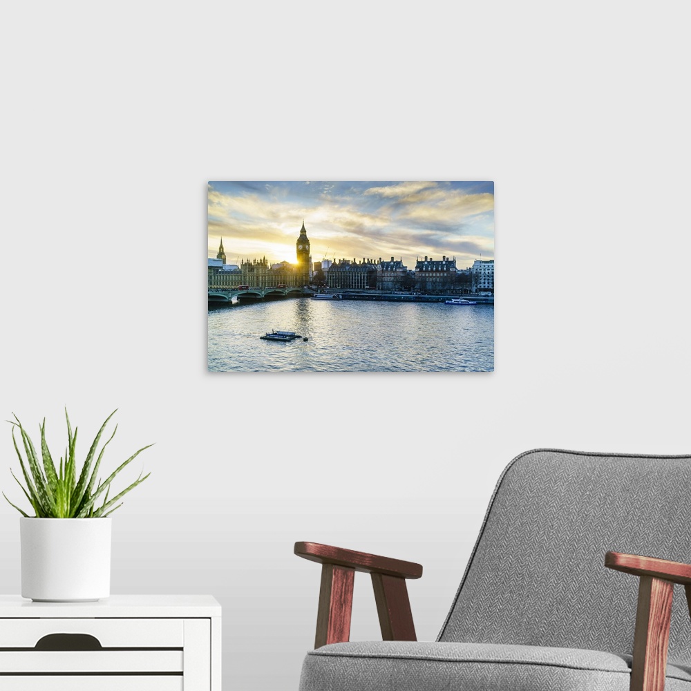A modern room featuring Big Ben and Westminster Bridge at sunset, London, England