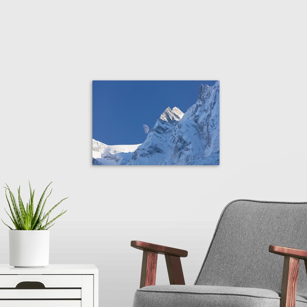 A modern room featuring Blue sky and moon on the snowy ridges of the high peaks, Soglio, Bregaglia Valley, Canton of Grau...
