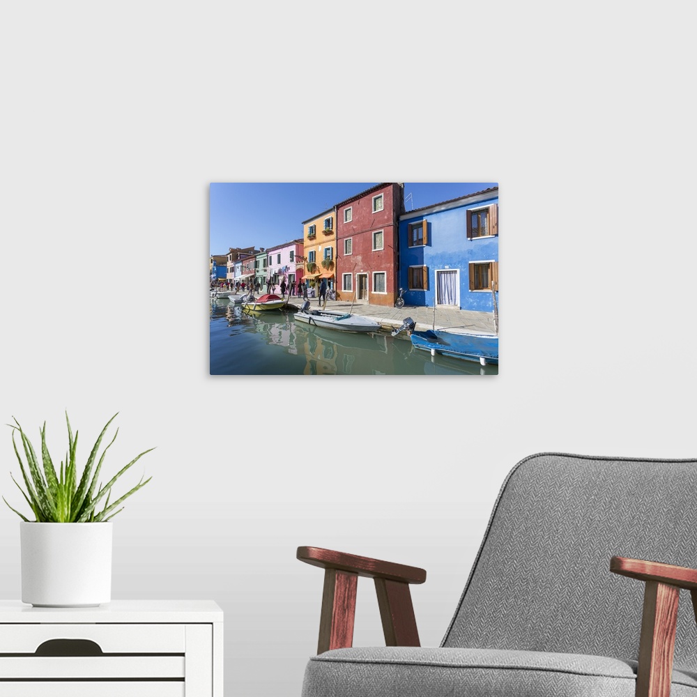 A modern room featuring Canal and colourful facade, Burano, Veneto, Italy, Europe
