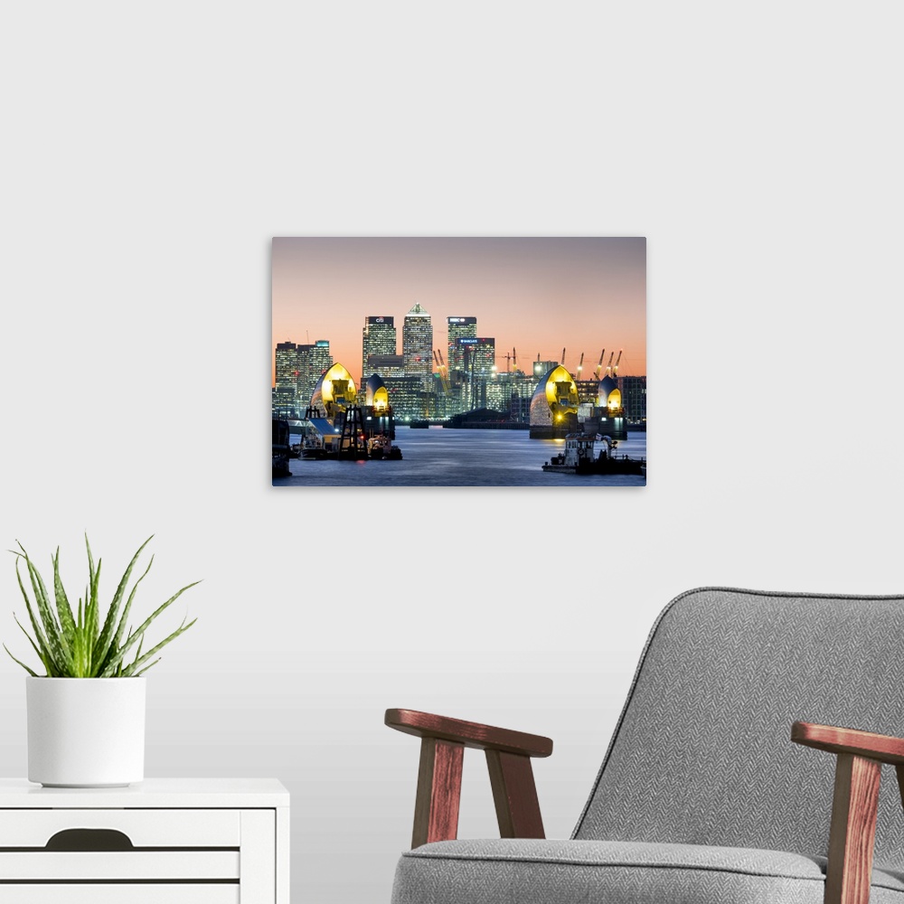 A modern room featuring Canary Wharf with Thames Barrier, London, England