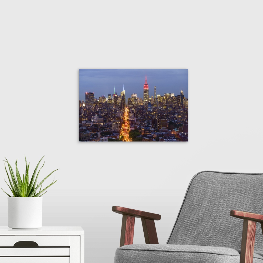 A modern room featuring Empire State Building and city skyline, Manhattan, New York City, United States of America, North...