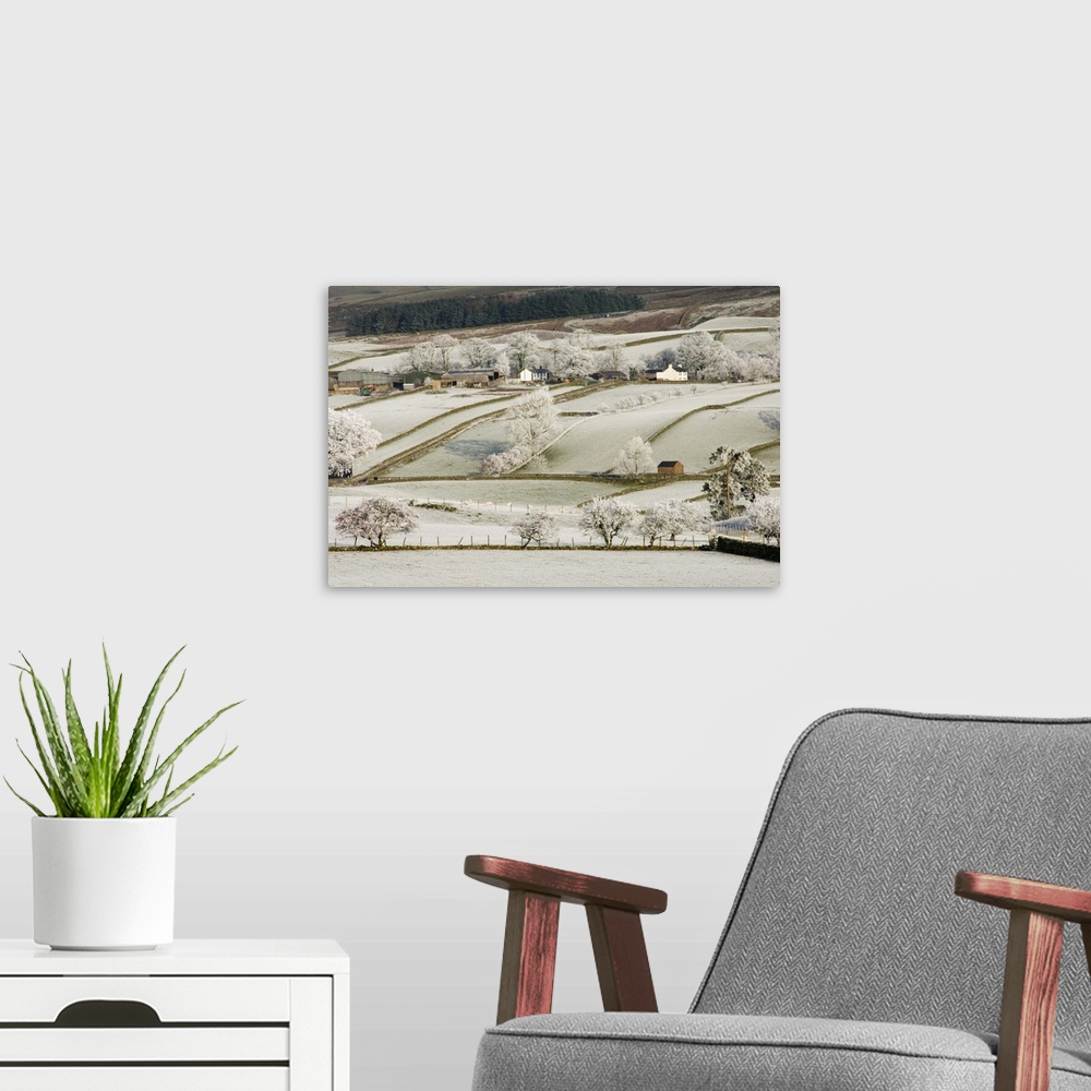 A modern room featuring Farm community, the Pennines in winter, Cumbria, England