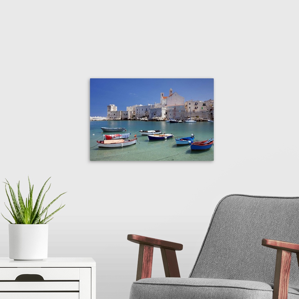 A modern room featuring Fishing boats at the harbour, old town with cathedral, Giovinazzo, Bari district, Puglia, Italy, ...