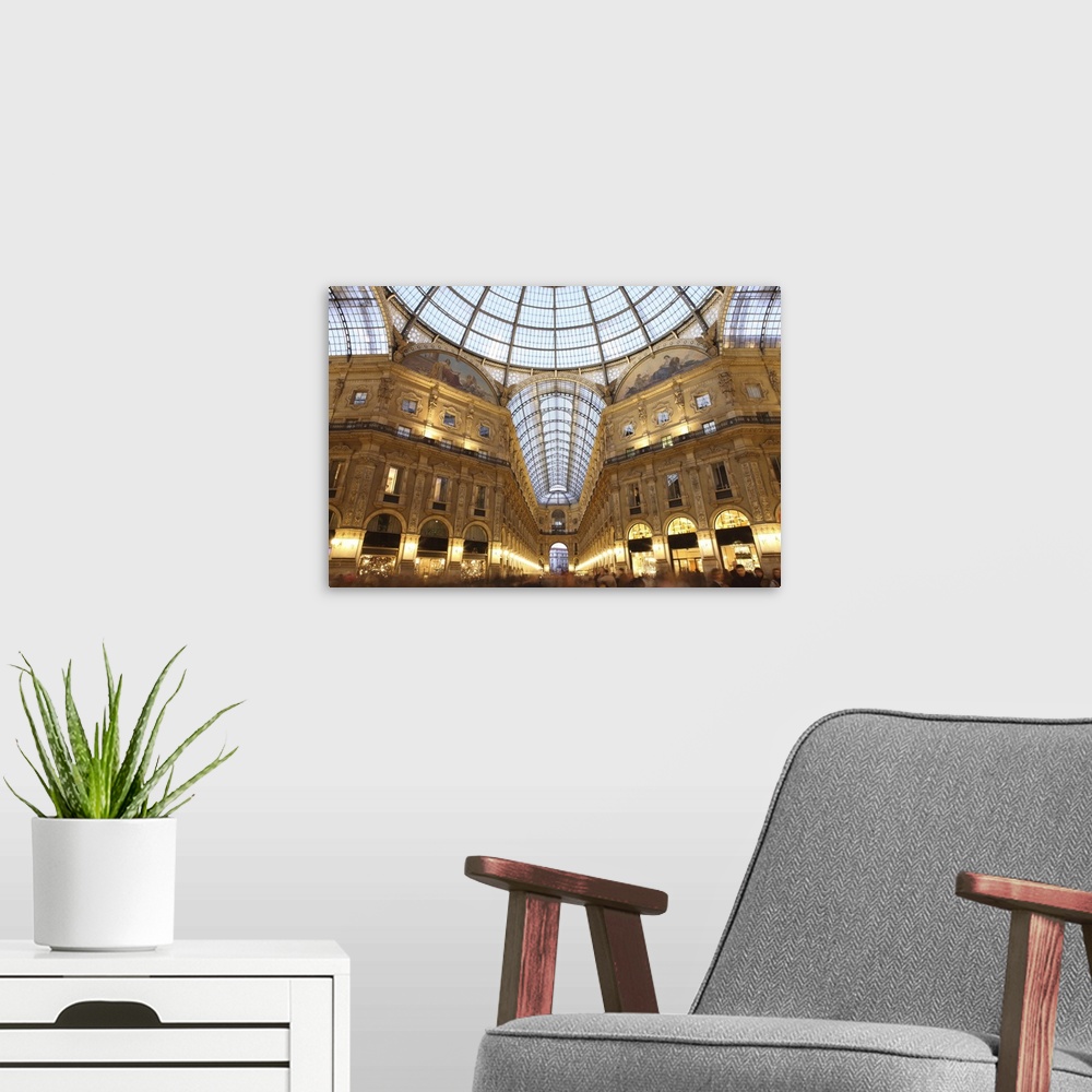 A modern room featuring Galleria Vittorio Emanuele at dusk, Milan, Lombardy, Italy