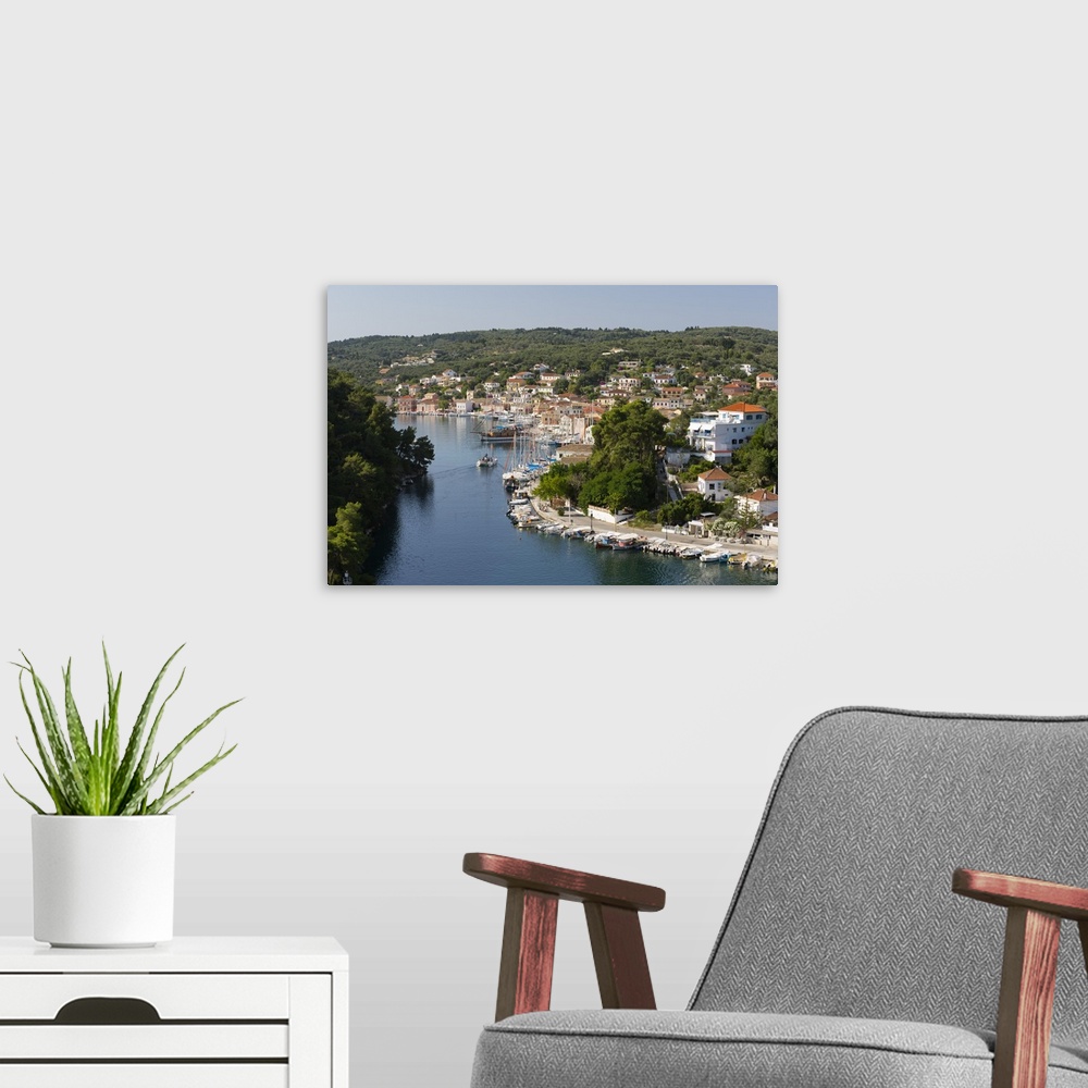 A modern room featuring Harbour of Gaios town, Paxos, Ionian Islands, Greek Islands, Greece, Europe