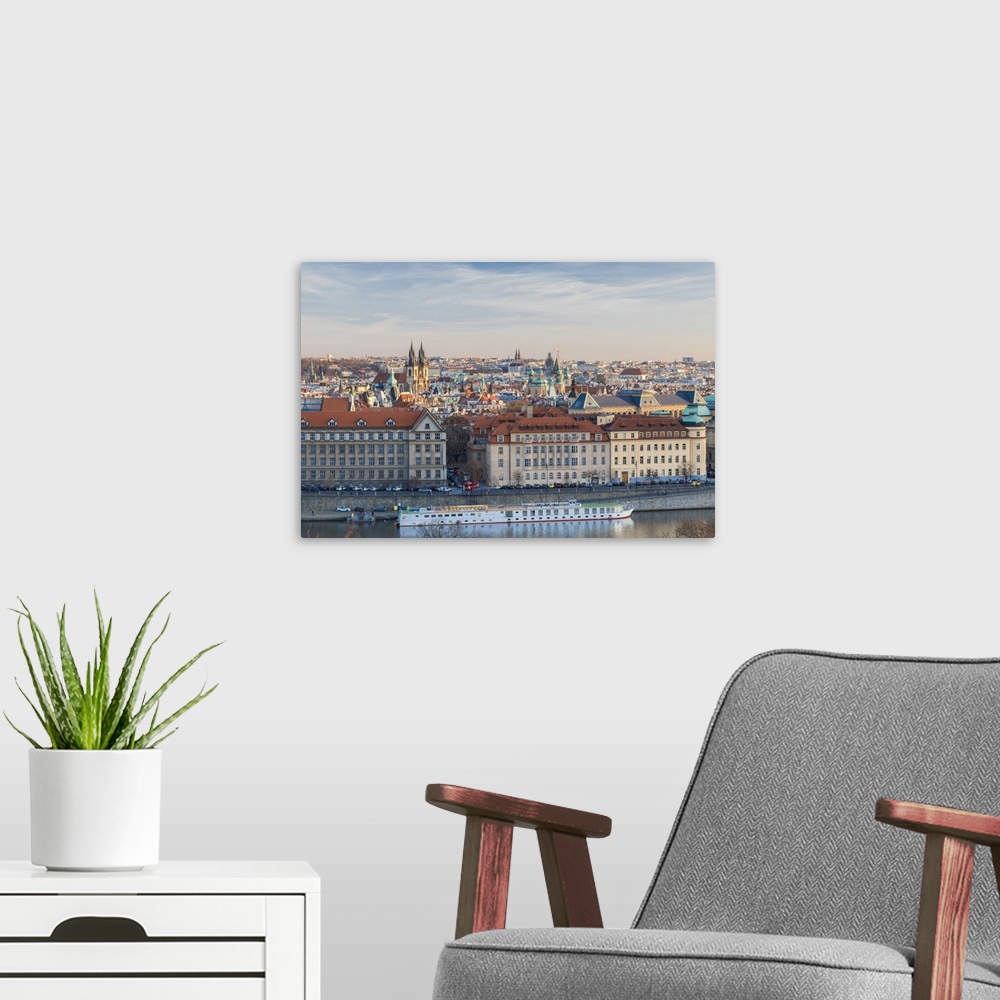 A modern room featuring View of the historical buildings of the old town from Vltava River, Prague, Czech Republic
