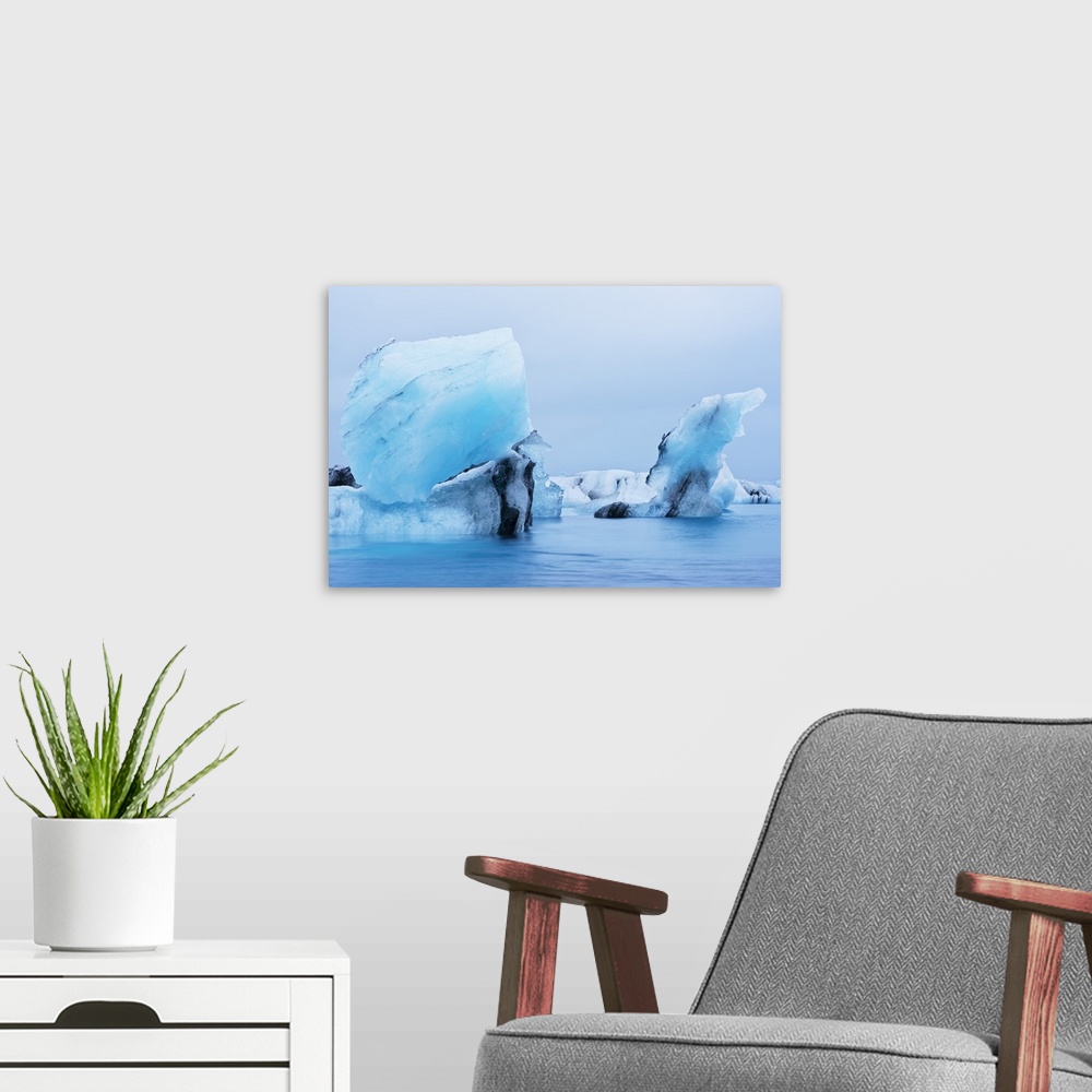 A modern room featuring Icebergs floating on Jokulsarlon Glacial Lagoon, Iceland, Polar Regions