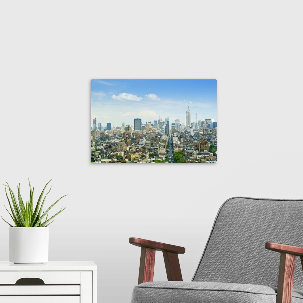 A modern room featuring Manhattan skyline with the Empire State Building, New York City, United States of America, North ...