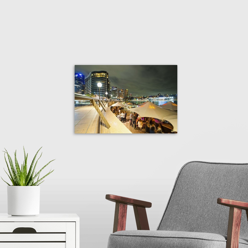 A modern room featuring Opera Bar and Circular Quay at night, Syndey, New South Wales, Australia, Pacific