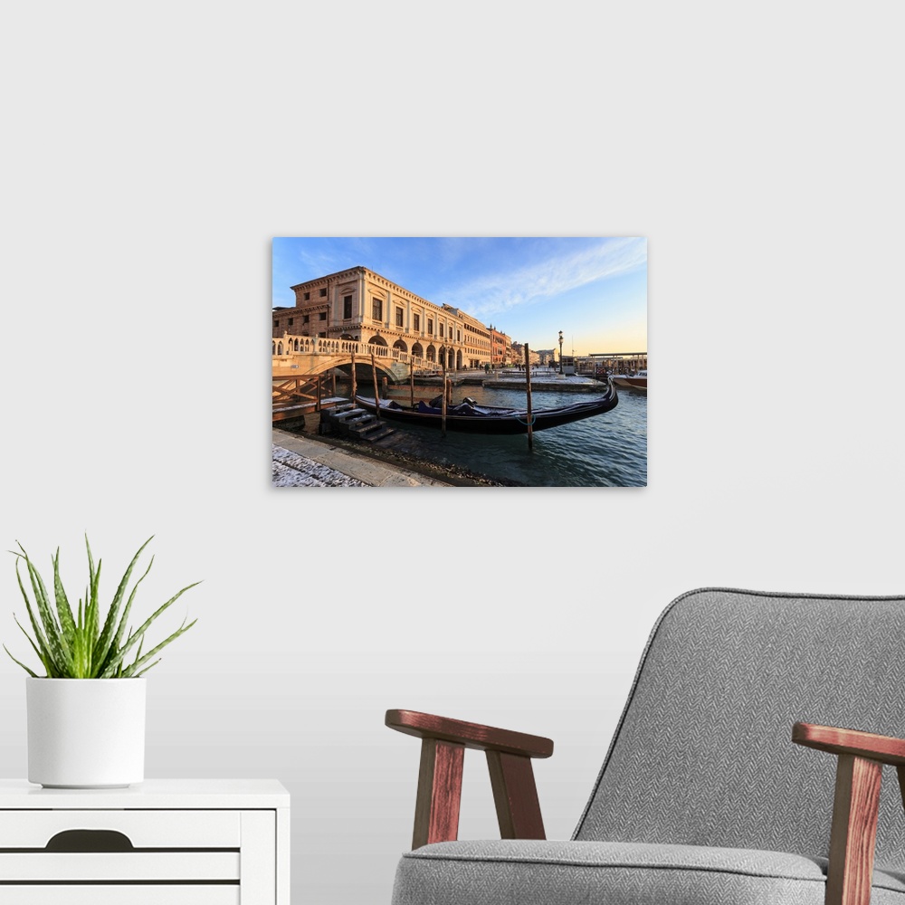 A modern room featuring Gondola, Ponte Della Paglia and Riva Degli Schiavoni at sunrise after snow, Venice, Veneto, Italy