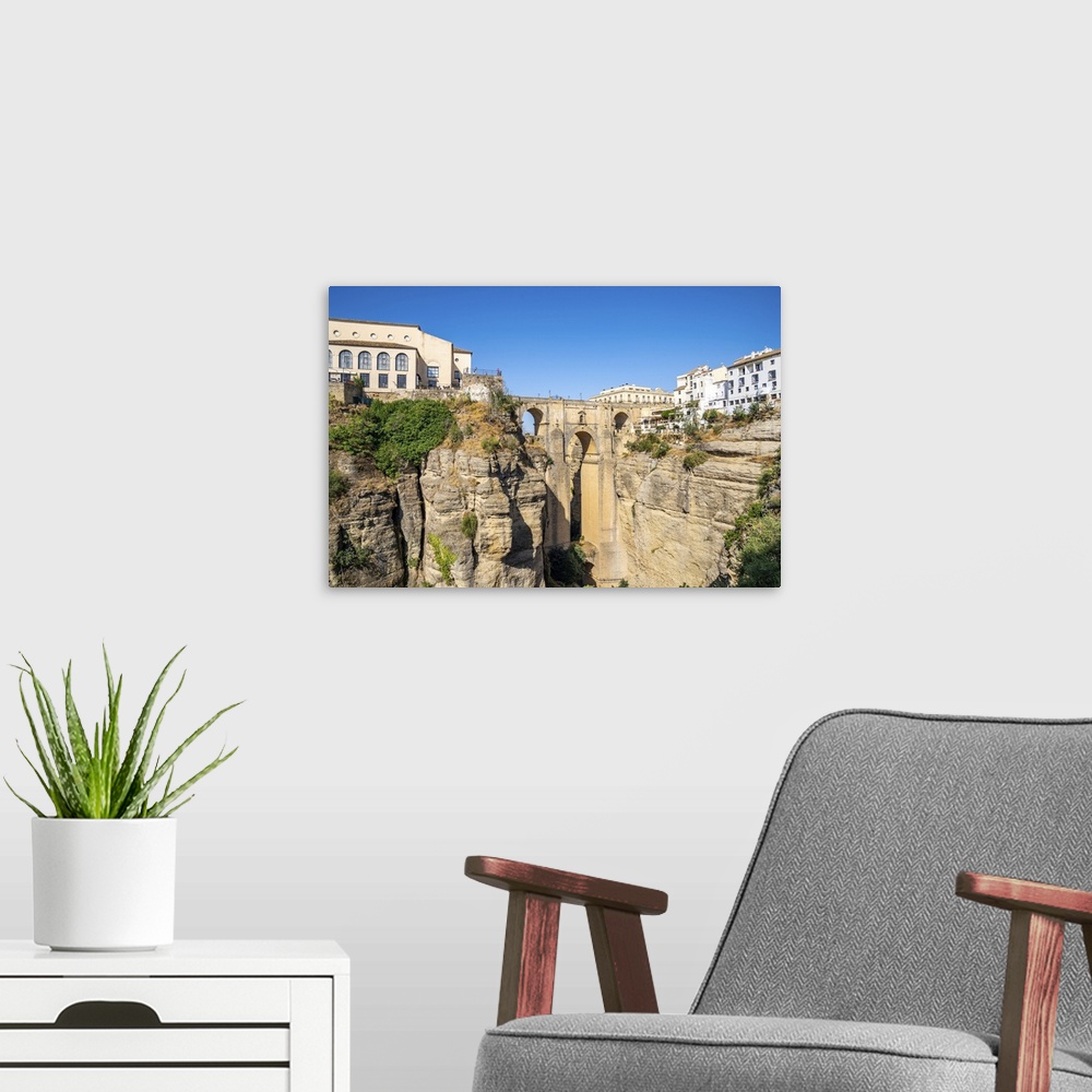 A modern room featuring Puente Nuevo (New Bridge), the tallest of the three bridges in Ronda crossing the Guadalevin Rive...