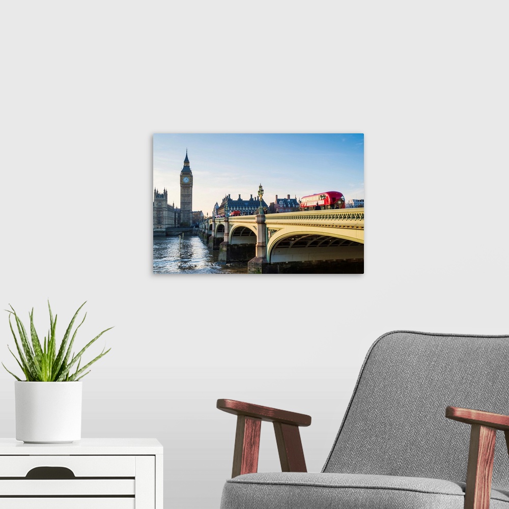 A modern room featuring Red bus crossing Westminster Bridge towards Big Ben and the Houses of Parliament, London, England...