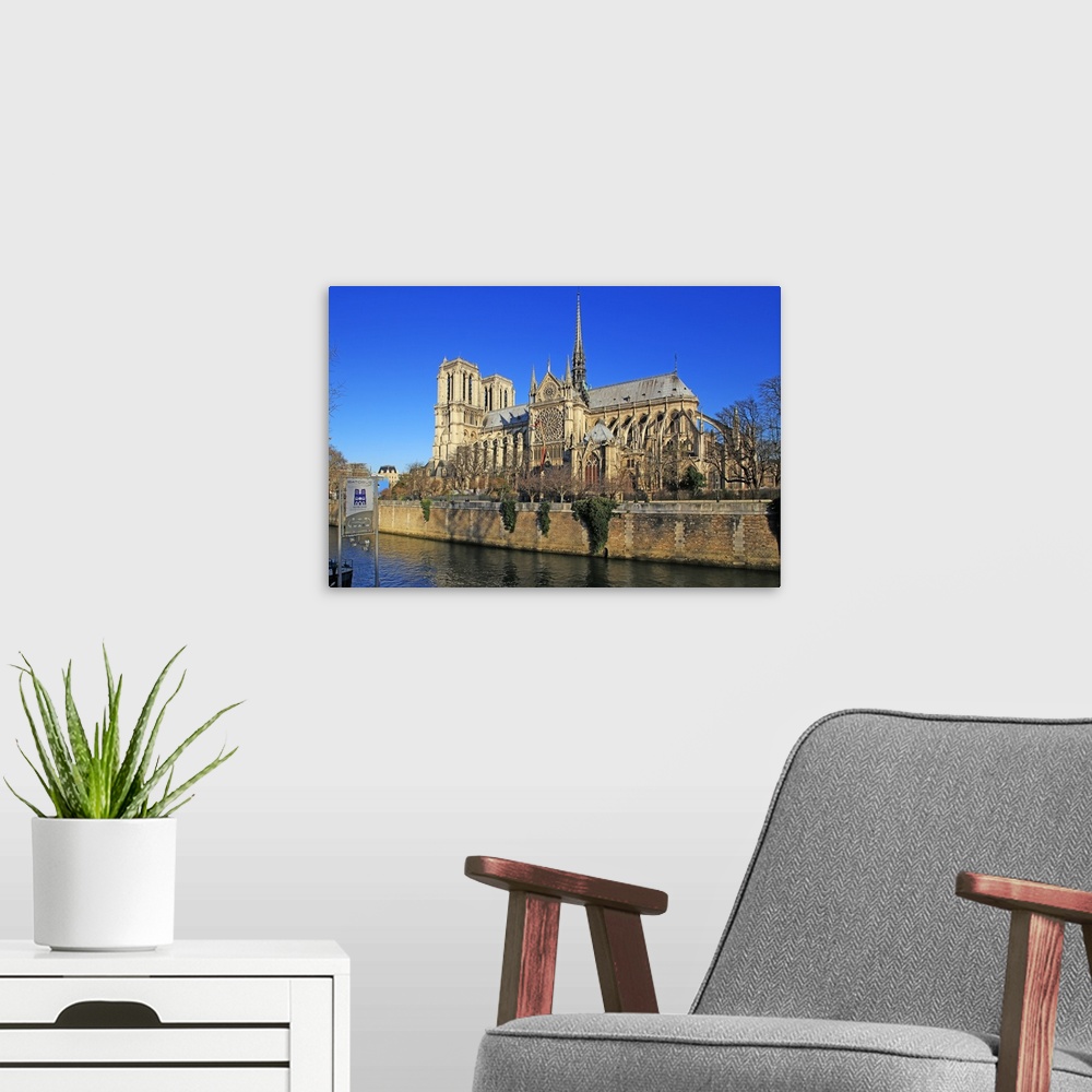 A modern room featuring Seine River with Notre Dame Cathedral, Paris, Ile de France, France