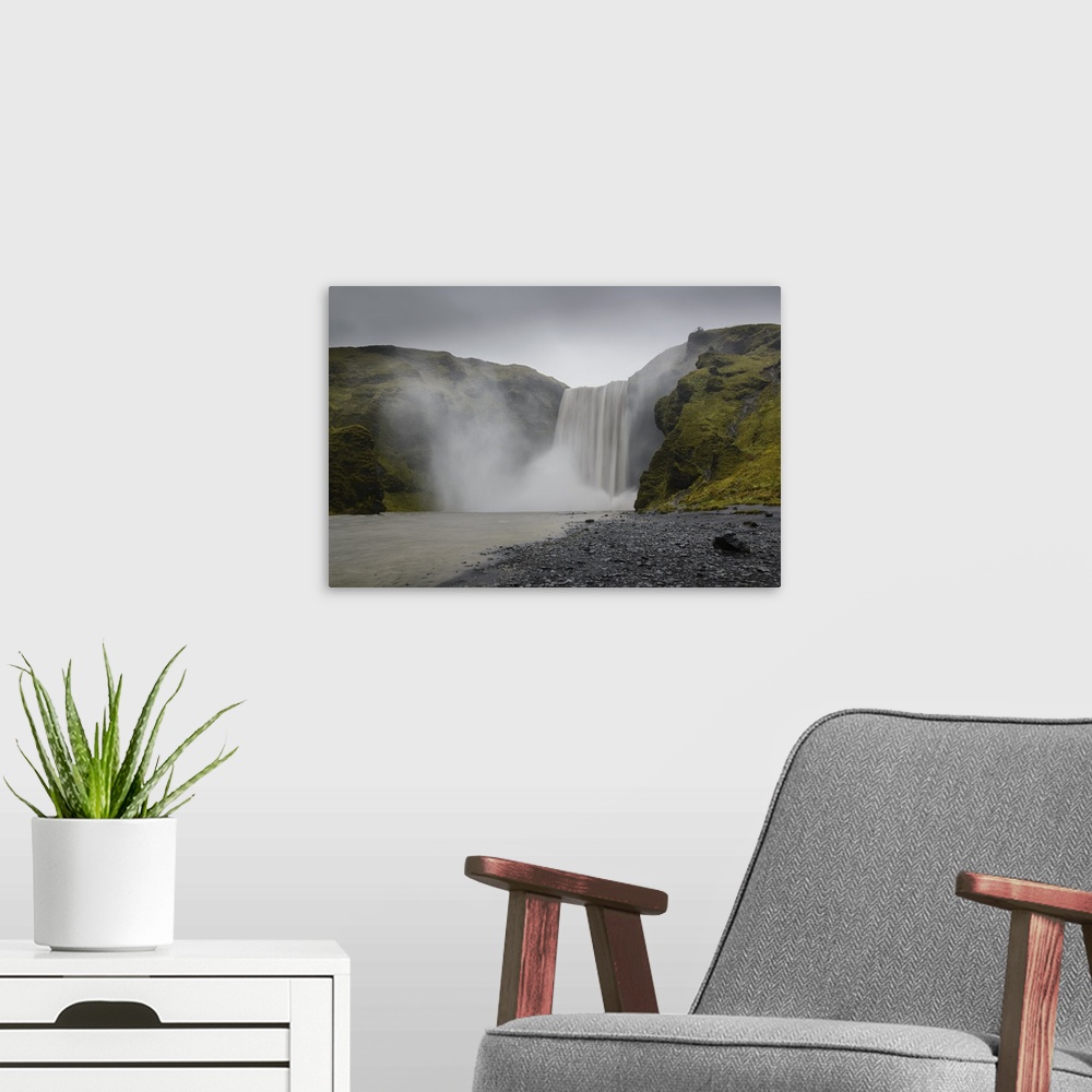 A modern room featuring Skogafoss waterfall, Iceland, Polar Regions