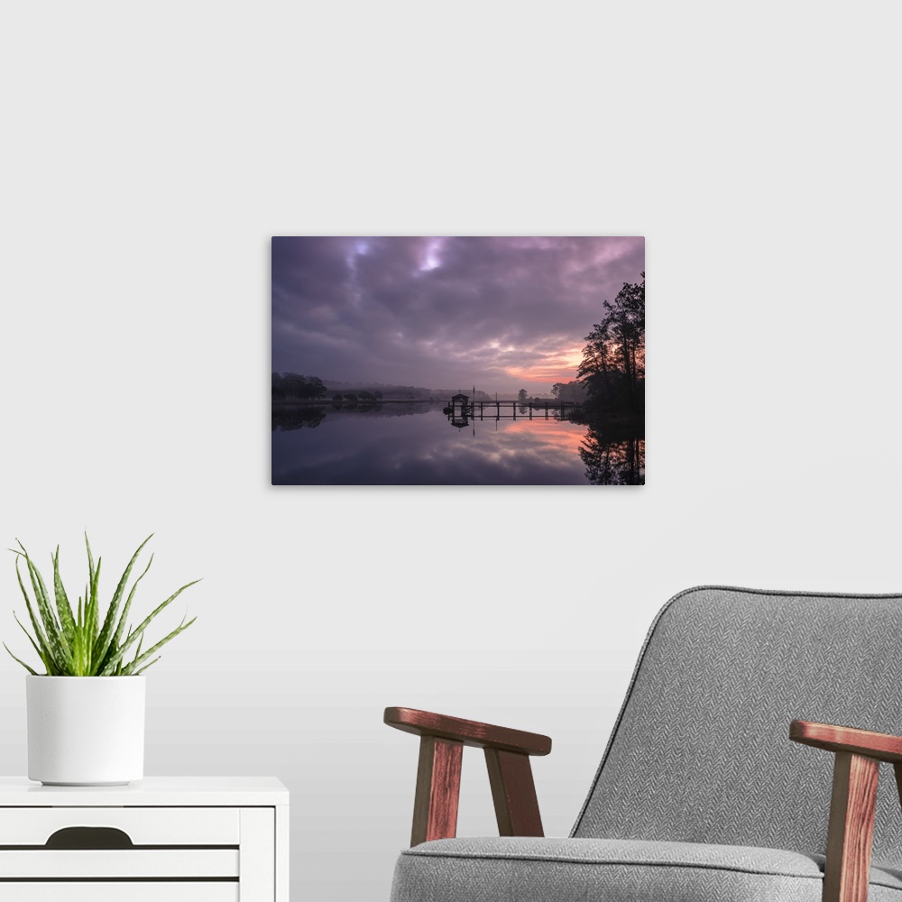 A modern room featuring Sunrise and dock on intracoastal waterway, Calabash, North Carolina, United States of America, No...