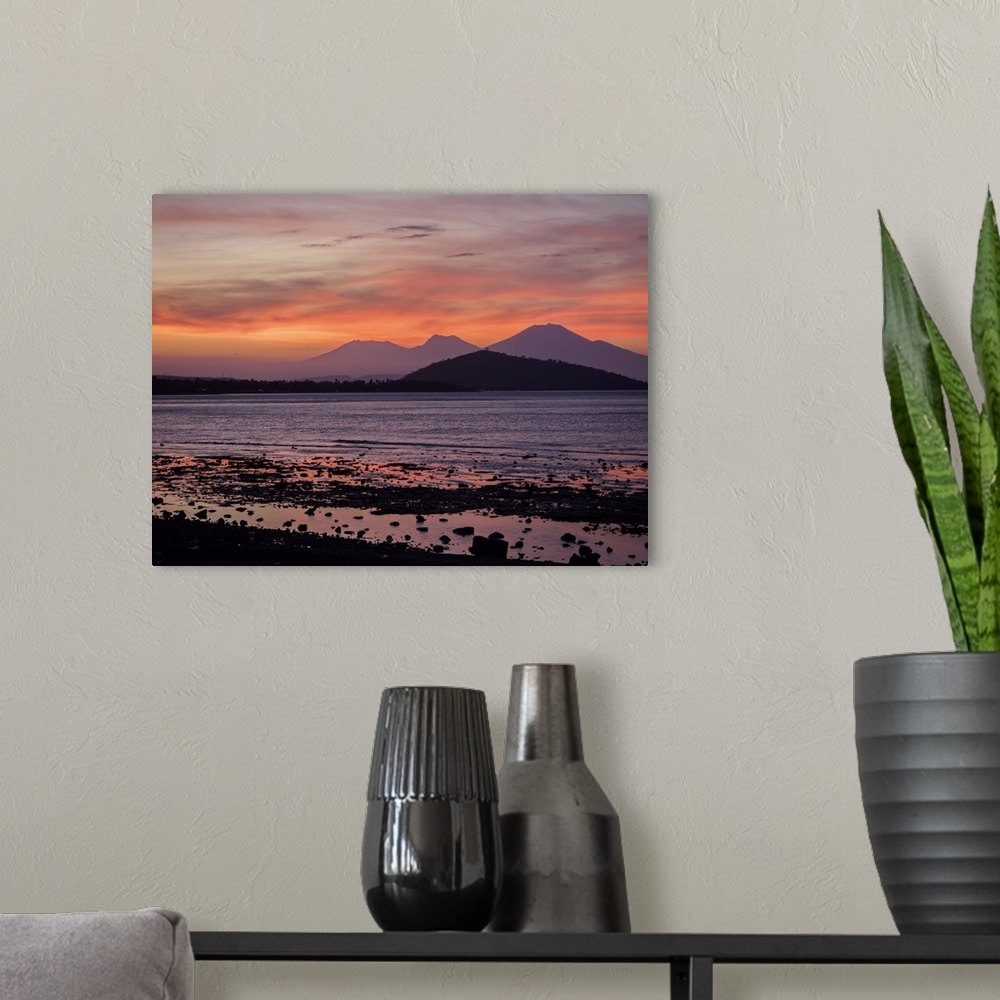 A modern room featuring Sunset, looking from Bali to Java, Indonesia, Southeast Asia, Asia