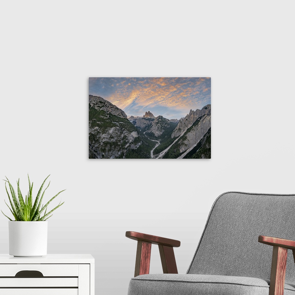 A modern room featuring Sunset over Tre Cime di Lavaredo and woods, aerial view, Sesto (Sexten) Dolomites, Bolzano provin...