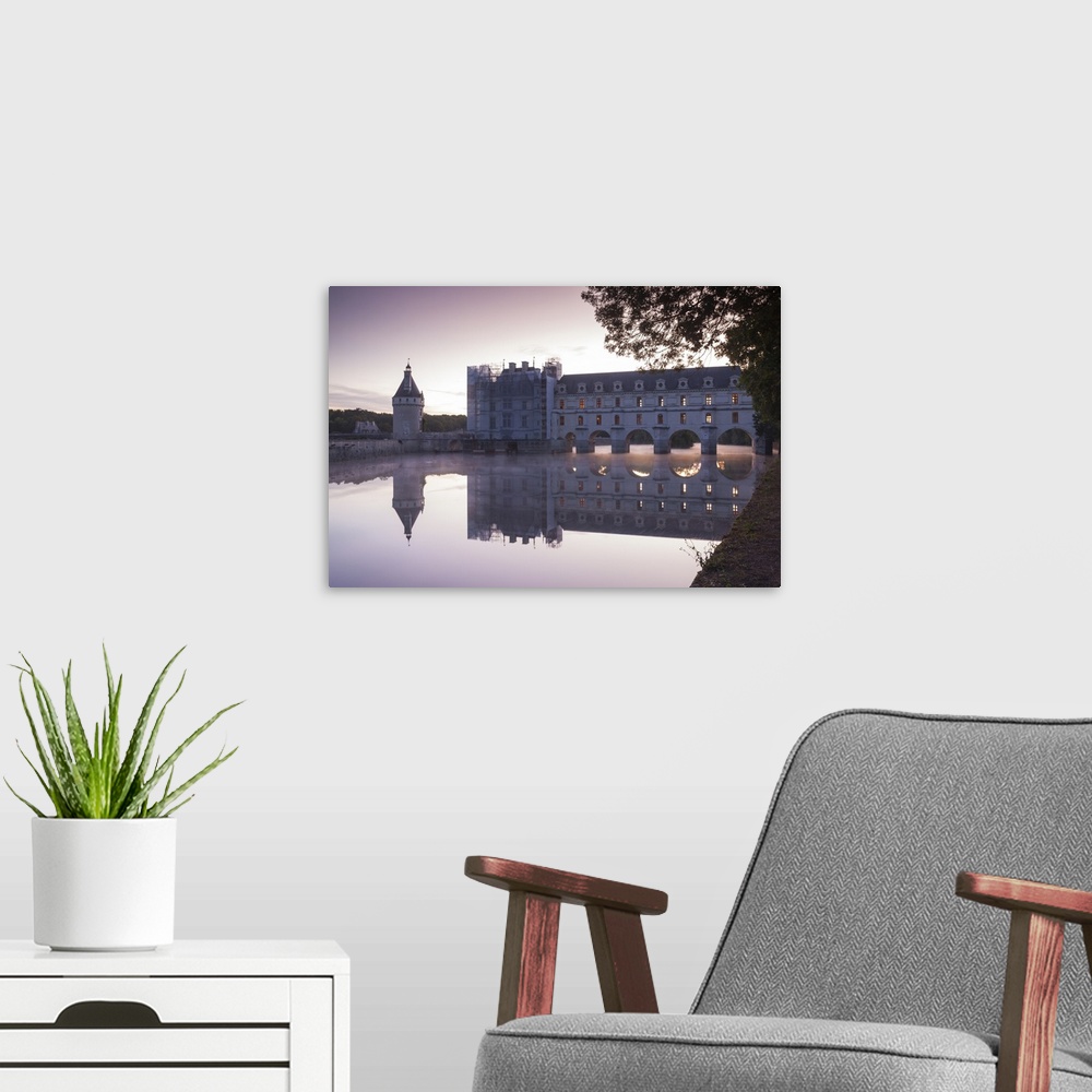 A modern room featuring The chateau of Chenonceau reflecting in the waters of the River Cher at dawn, Indre-et-Loire, Loi...