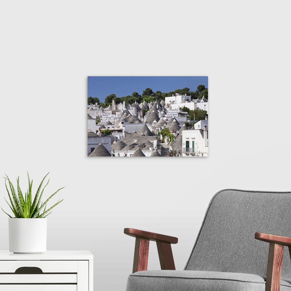 A modern room featuring Trulli, traditional houses, Rione Monti area, Alberobello, UNESCO World Heritage Site, Valle d'It...