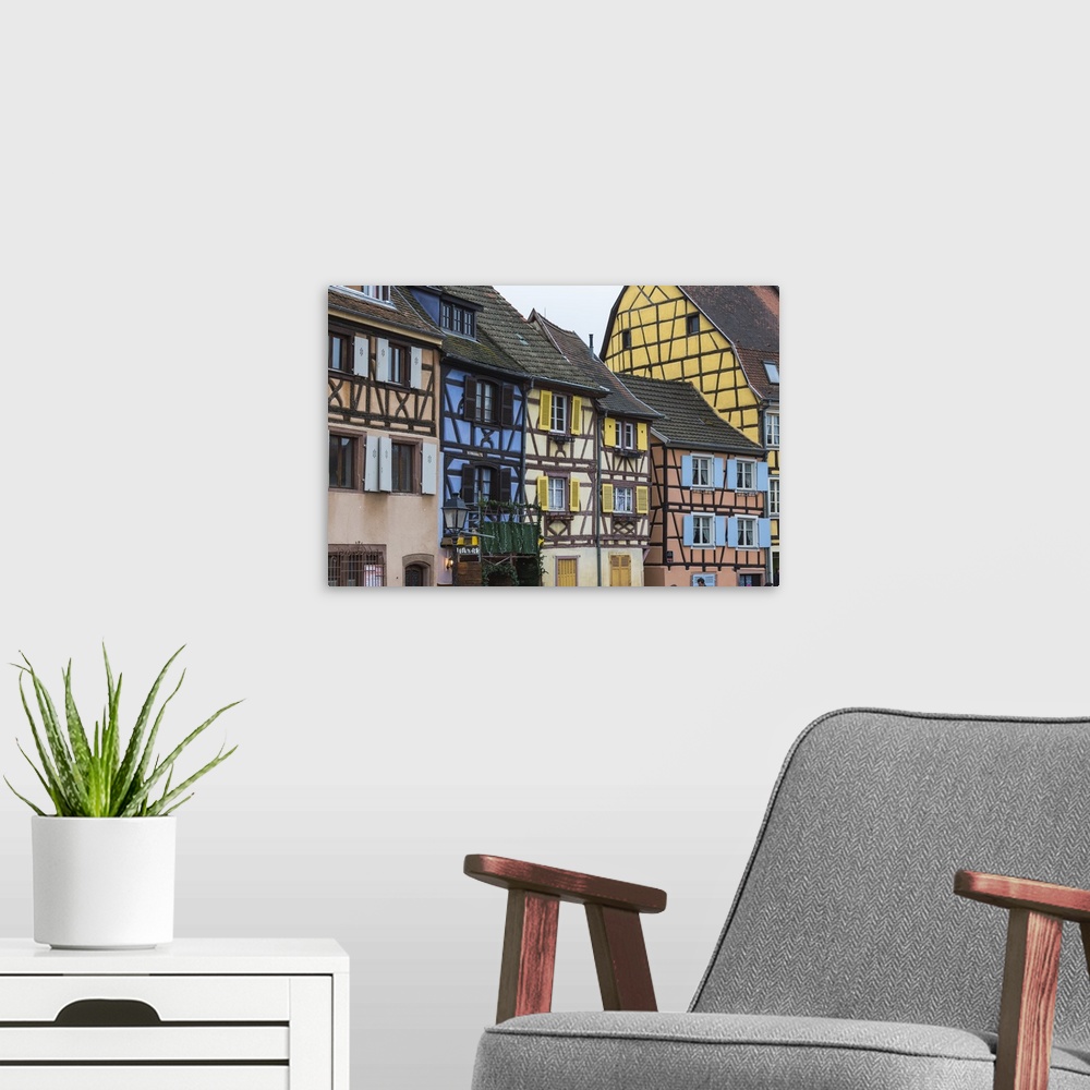 A modern room featuring Typical architecture and colored facade of house in the old town, Petite Venise, Colmar, Haut-Rhi...