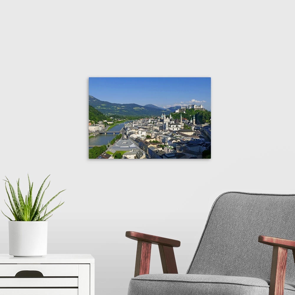 A modern room featuring View from Moenchsberg Hill across Salzach River with Cathedral, Collegiate Church and Fortress Ho...